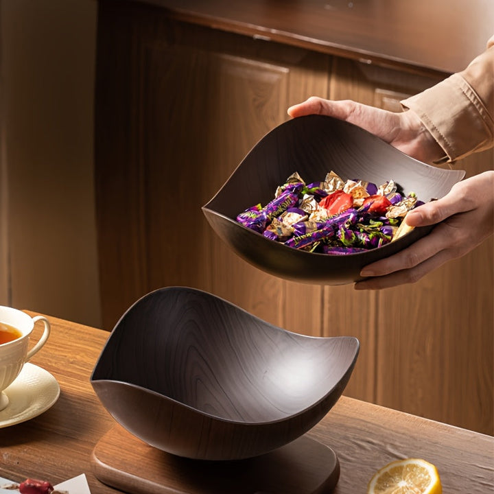 Light brown wood look fruit bowl, a stylish home accessory for modern kitchen decor.