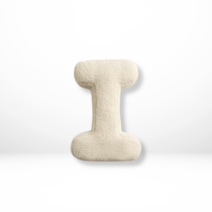 Plush velvet 'M' alphabet cushion, a decorative pillow for personalized home decor & soft furnishings.