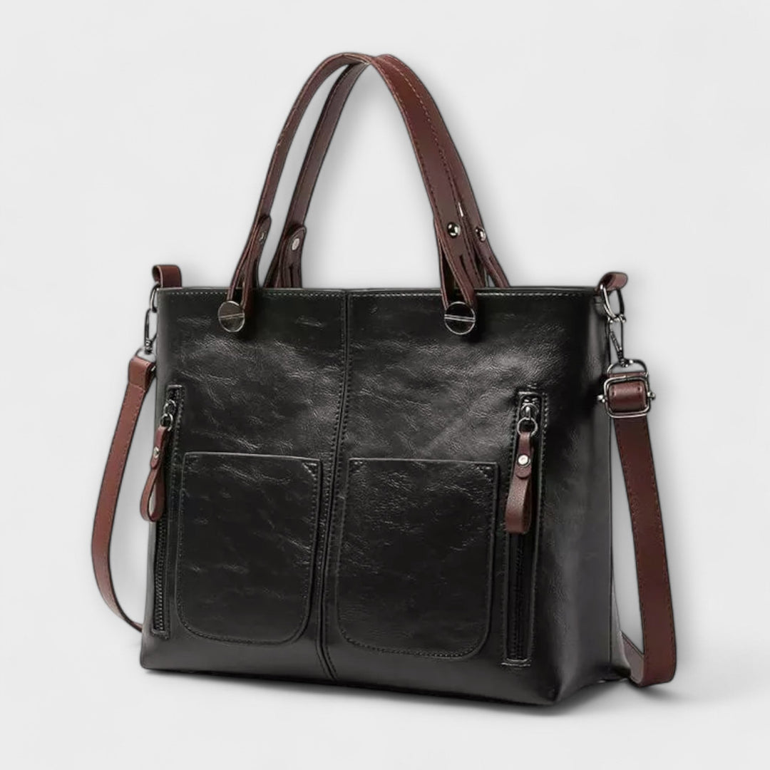 Timeless women's classic black leather shoulder bag, an elegant & versatile daily fashion accessory.
