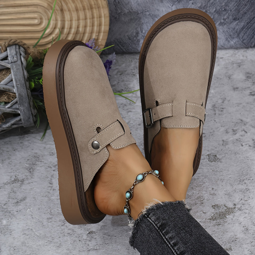 Stylish women's closed-toe clogs with a platform for added height & comfort.