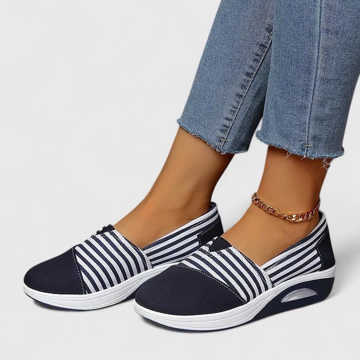 Comfortable women's sneakers with advanced orthopedic support, ideal for active walking.