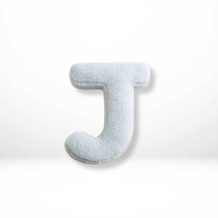 Modern velvet 'N' letter cushion, perfect for personalized living room decor & stylish home accents.