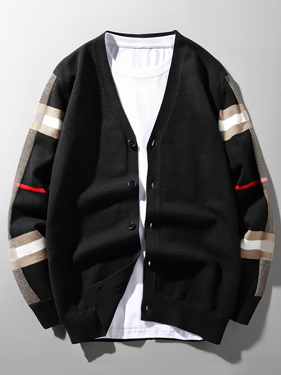 Elegant men's handcrafted button cardigan. Sophisticated layering piece for cold weather style.