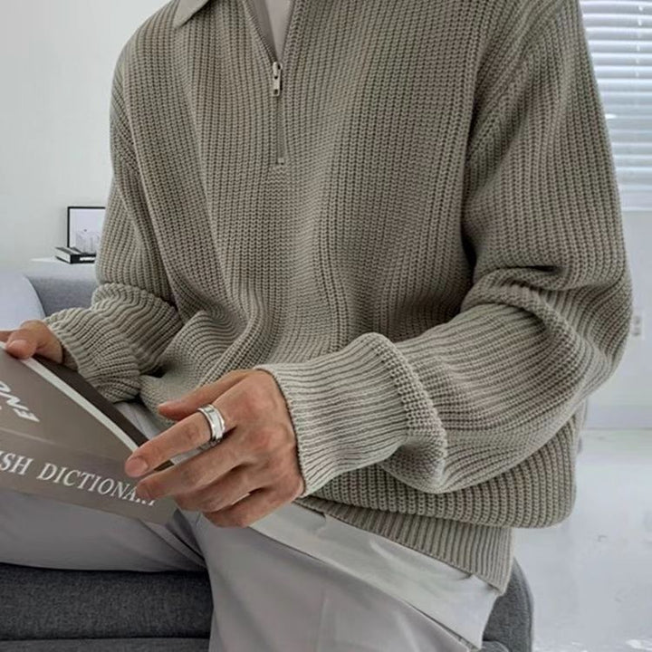 Comfortable men's quarter-zip ribbed knit sweater, a versatile long-sleeve for stylish, casual layering.