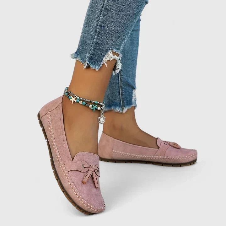 Modern women's orthopaedic loafers, stylish slip-on shoes with tassel detail for comfortable fashion.