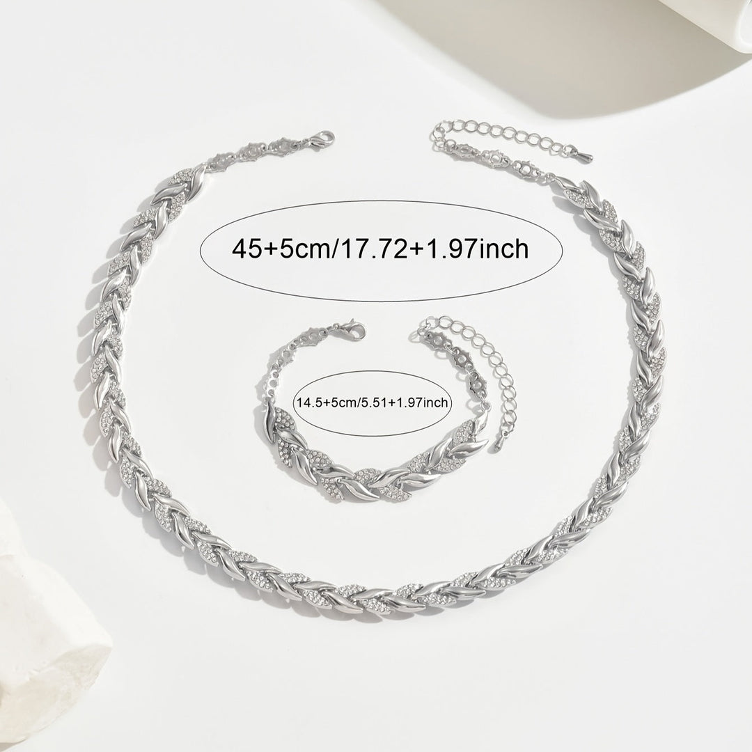 Glamorous rose gold fish tail jewelry set for women, embellished with rhinestones, adding sparkle to any outfit.