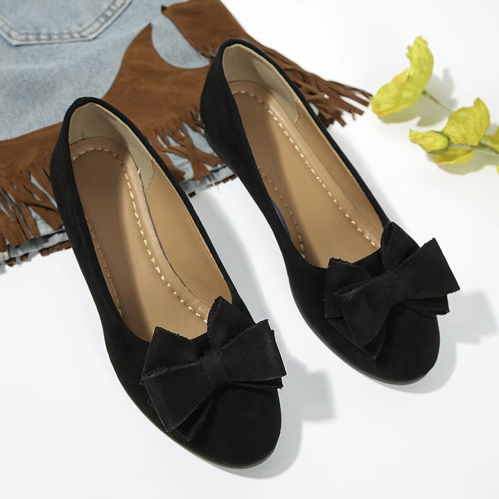 Women's supportive orthopedic footwear, comfortable ballet flats for daily activity.