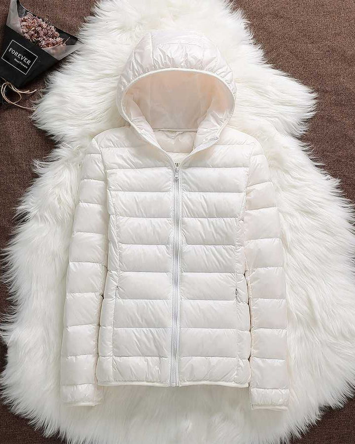 Everyday elegant women's lightweight waterproof jacket. Stylish all-weather coat for versatile comfort & rain.