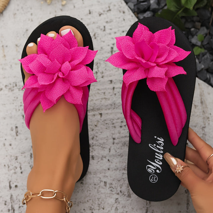 Fashionable ladies' platform sandals with a charming floral detail, perfect wide fit.