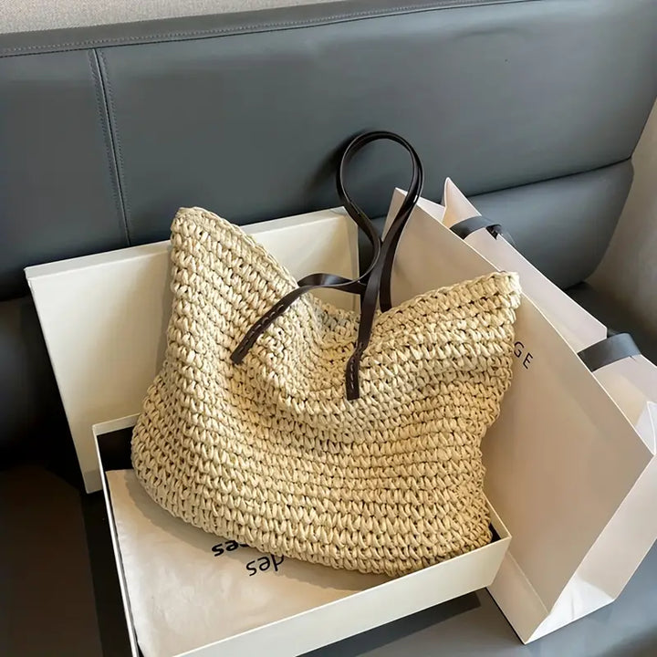 Elegant large bohemian woven tote bag for women, a perfect summer beach and travel companion.