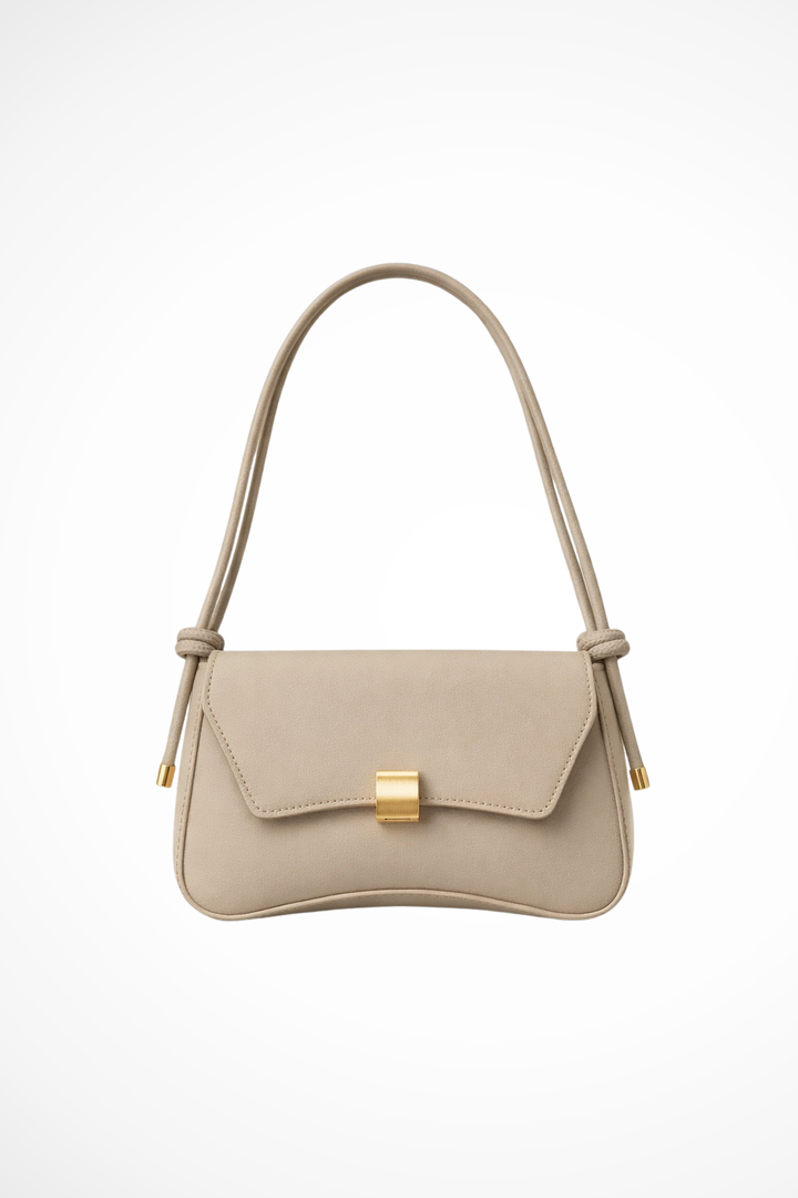 Women's minimalist shoulder bag with elegant gold clasp, perfect for everyday style.