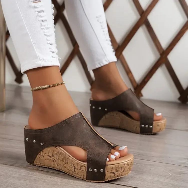 Elegant women's platform wedge sandals, offering orthopedic comfort and stylish open-toe design for summer.