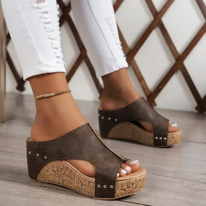 Elegant women's platform wedge sandals, offering orthopedic comfort and stylish open-toe design for summer.