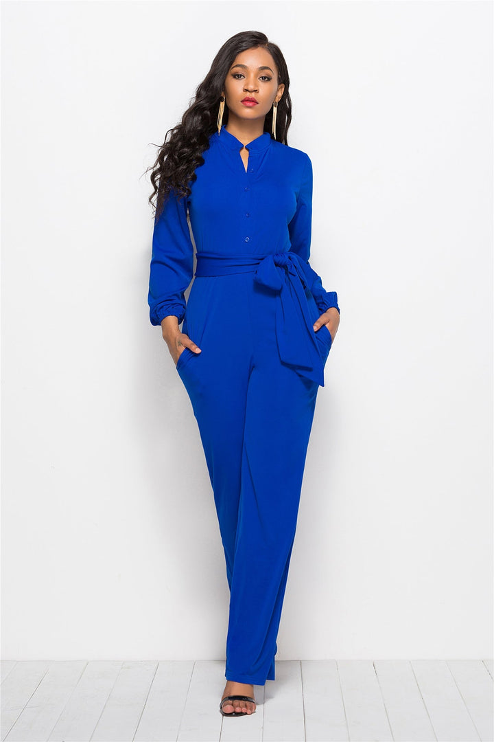 Stunning women's long-sleeve tailored jumpsuit, perfect party wear for a sophisticated evening look.