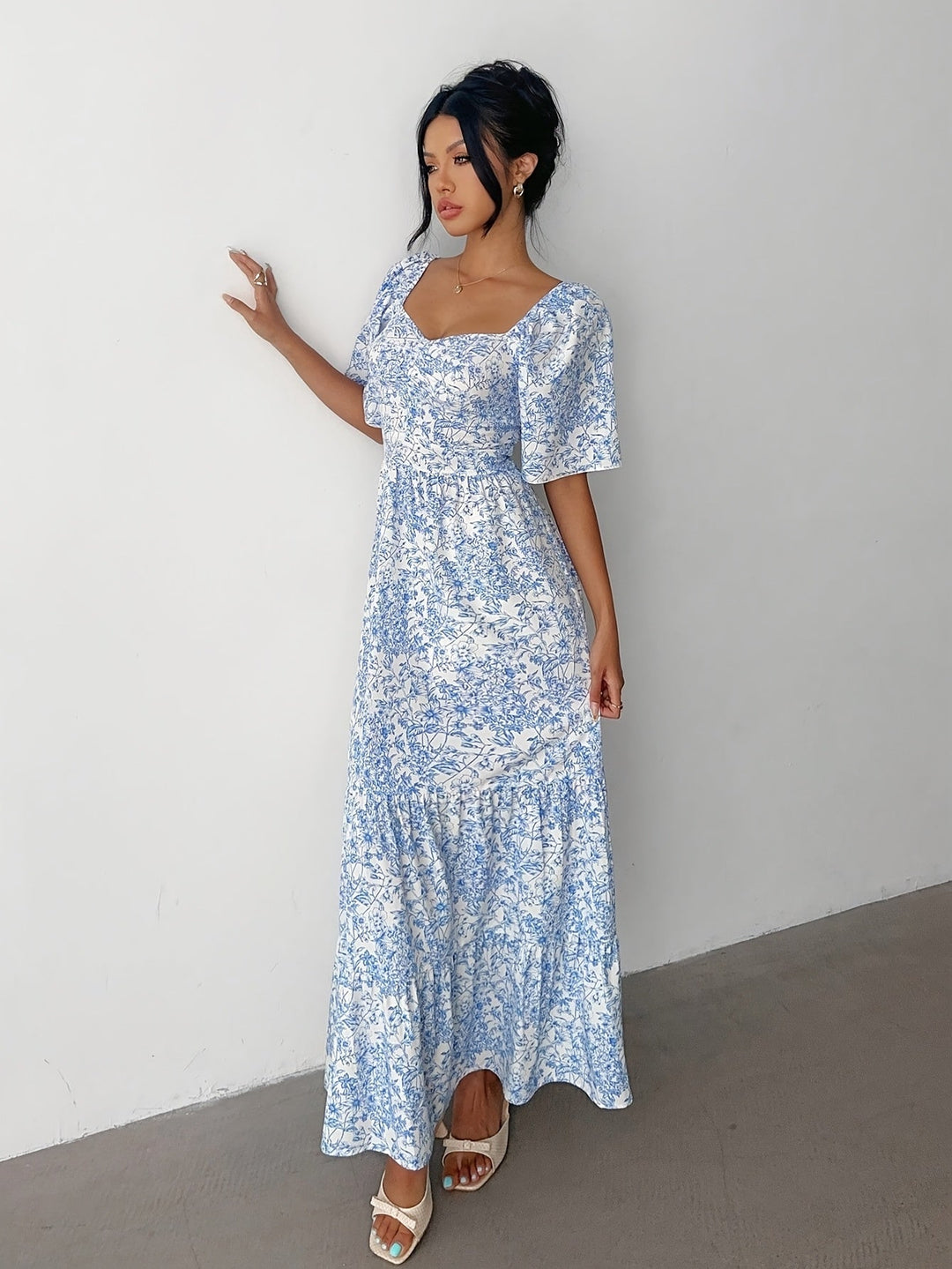 Sweetheart neckline floral maxi dress for women. Elegant tiered design, perfect ladies fashion for summer.