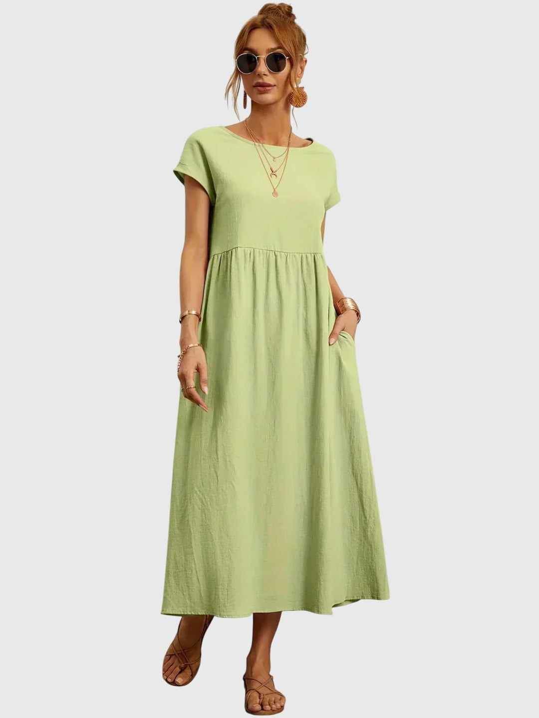 Modern women's casual pocket dress, perfect for comfortable everyday wear, versatile spring & summer style.