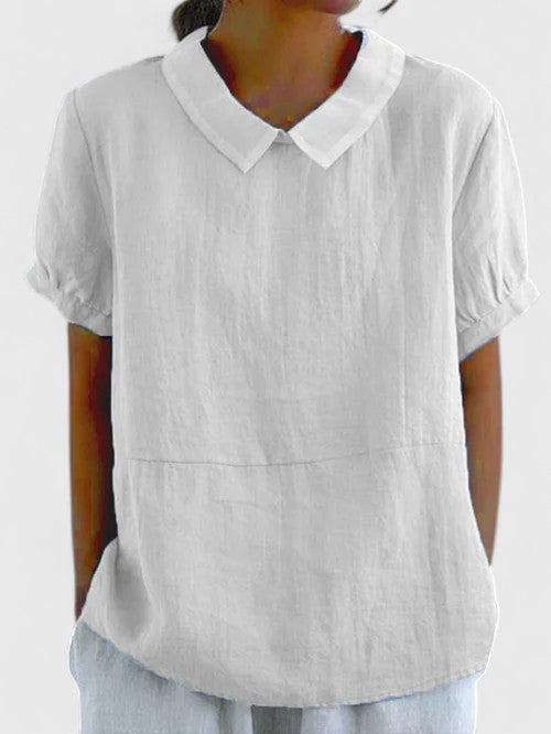 Women's elegant button-down shirt, a versatile long-sleeve top for sophisticated ladies' fashion.