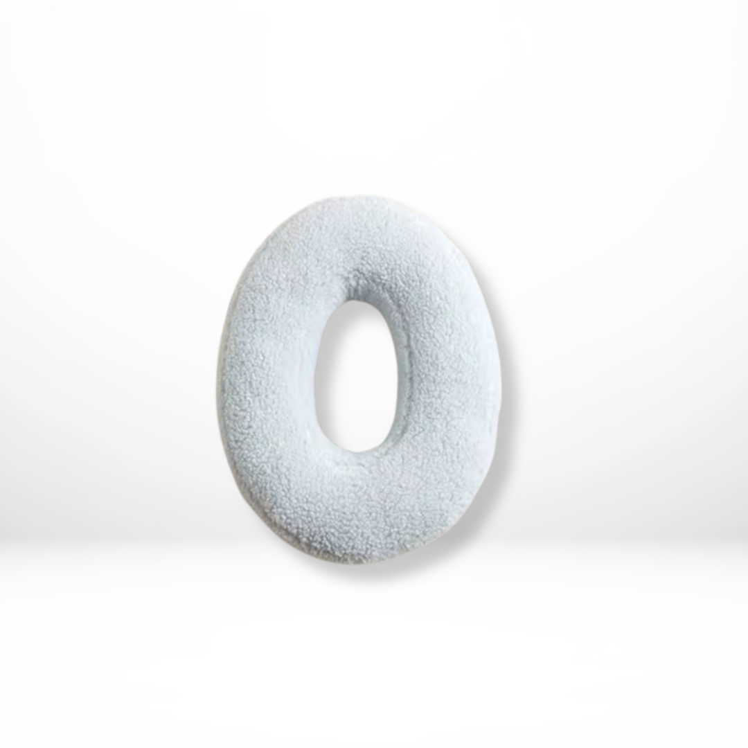 Personalized velvet 'S' alphabet cushion, perfect for initial decor & luxurious living room accents.