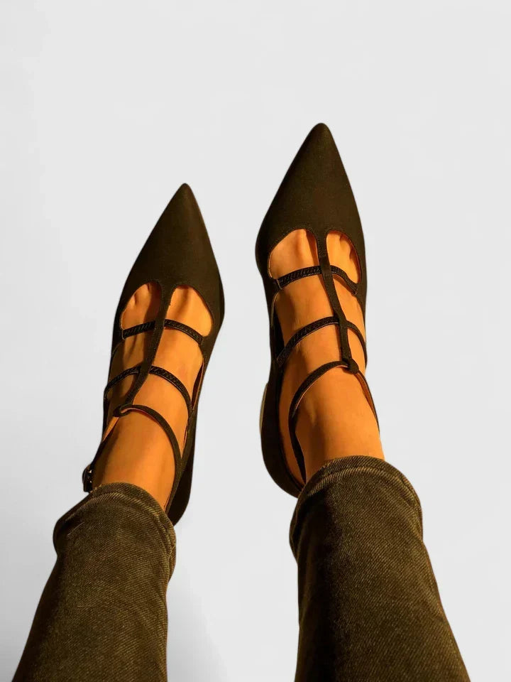 Side view of modern women's orthopaedic heels, emphasizing ergonomic design and stylish comfort footwear.