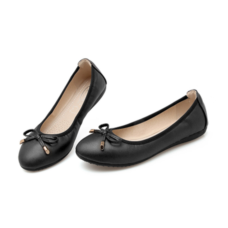 Modern classic women's elegant bow flats, a comfortable and versatile choice for any contemporary wardrobe.