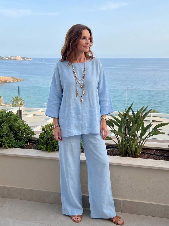 Modern women's oversized tunic & wide leg pant set, a comfortable and stylish two-piece loungewear outfit.
