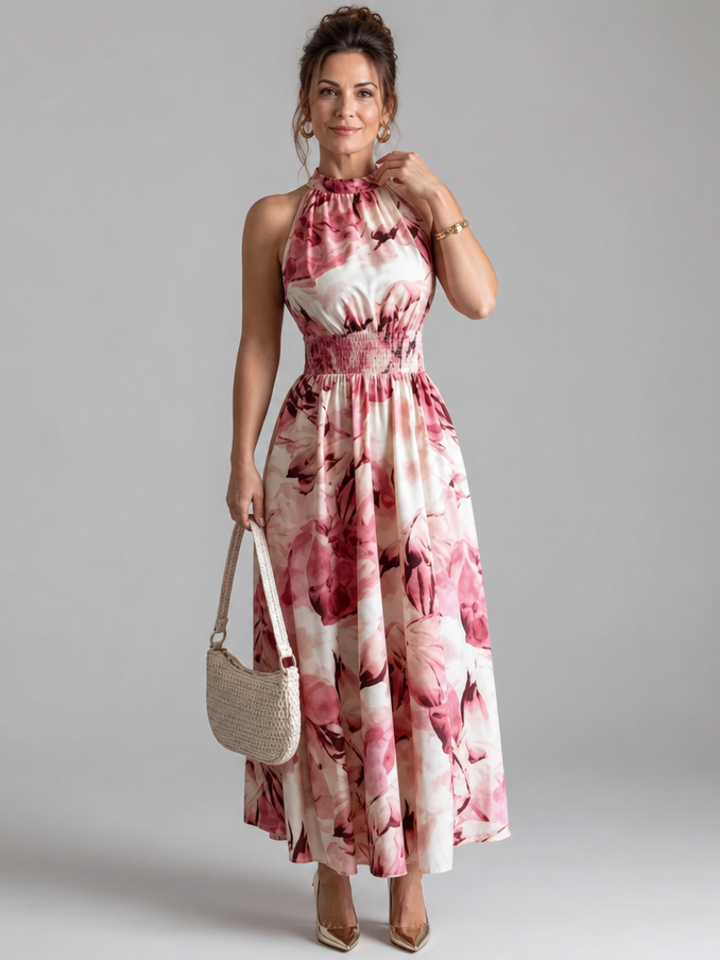 Elegant women's abstract print midi dress with a gathered waist and flowy skirt. Ideal for summer and vacation.