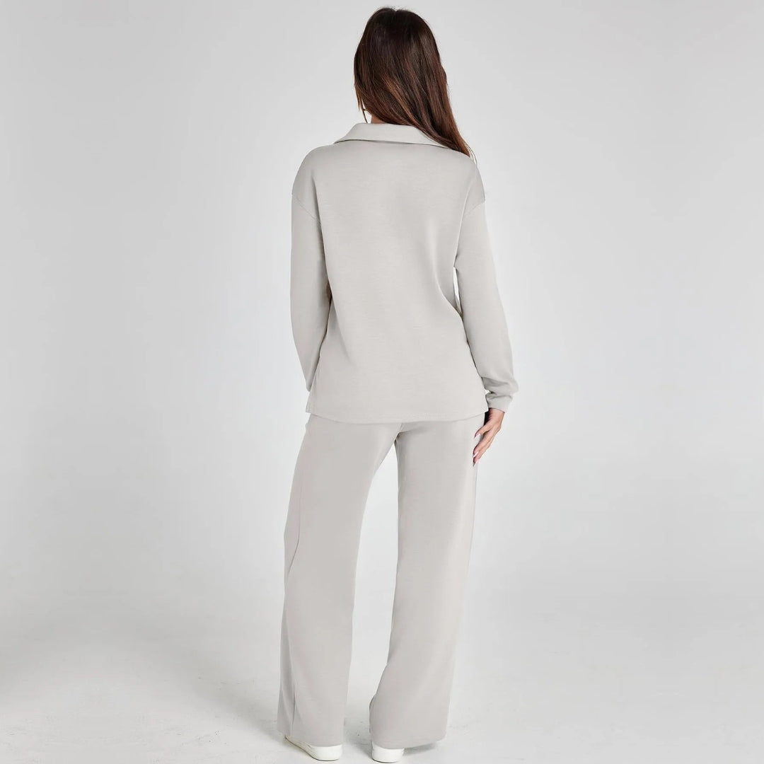 Women's relaxed fit loungewear set with V-neck long sleeve top and wide leg trousers. Cozy.