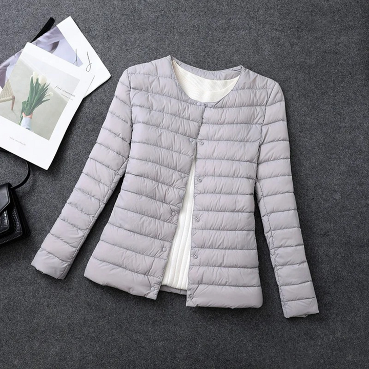 Cozy women's lightweight puffer down jacket. Essential fall & winter outerwear for everyday warmth & comfort.