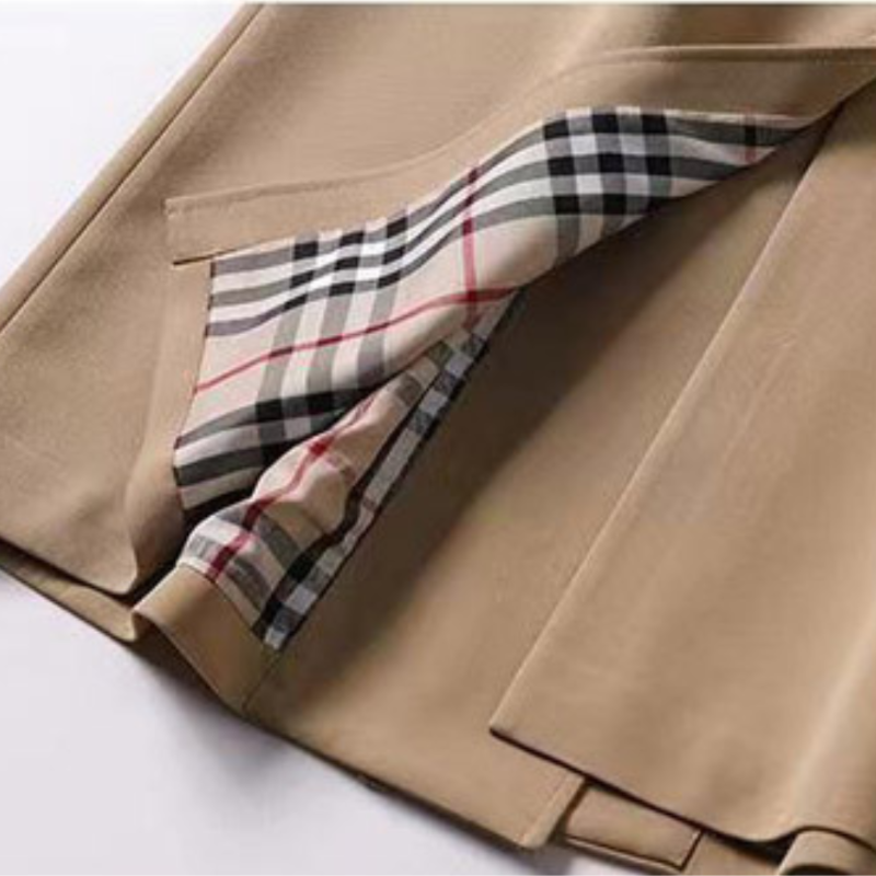 Sophisticated women's classic trench coat, a stylish belted jacket for weather-ready outfits.