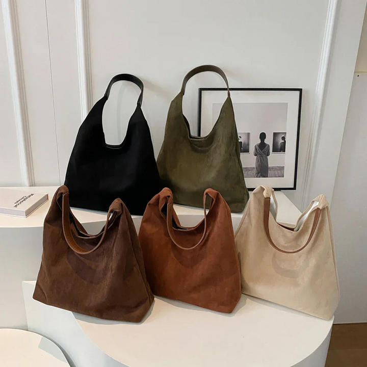 Chic beige suede handbag, a versatile women's shoulder bag for daily use.