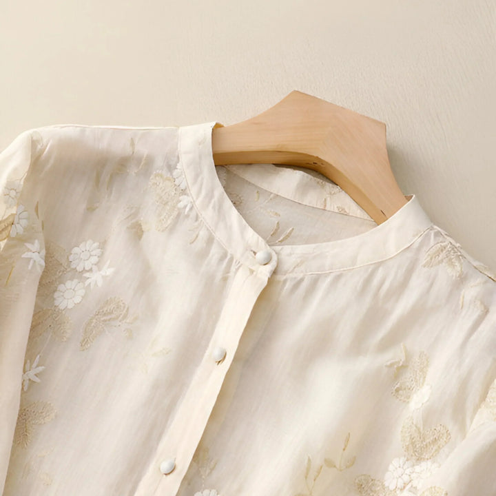 Women's elegant embroidered top with a tummy skimming cut for a flattering and relaxed fit.