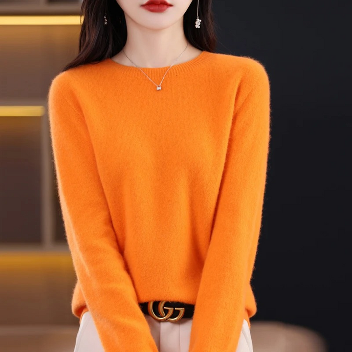 Warm round neck women's knitwear, a chic and soft long sleeve pullover for versatile styling.