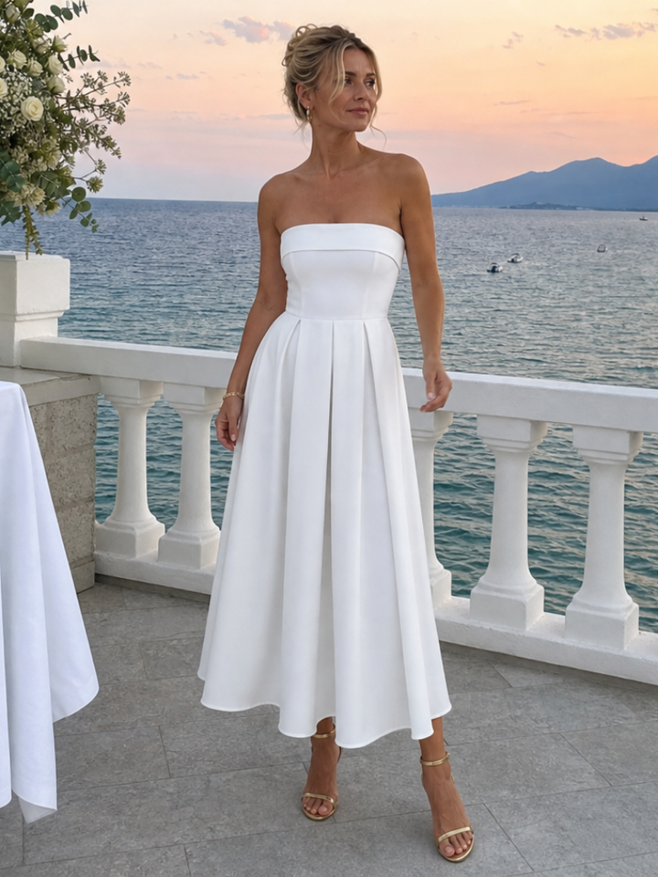 Versatile elegant strapless midi dress for women with a structured bodice, ideal for various occasions.