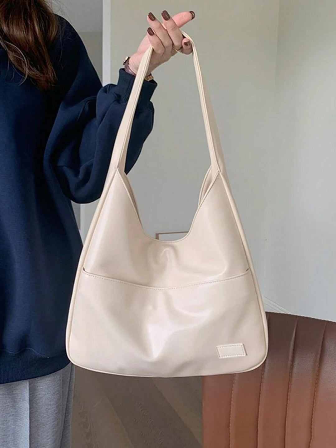 Practical women's vegan leather shoulder bag. Ideal everyday satchel for work, school, or stylish errands.
