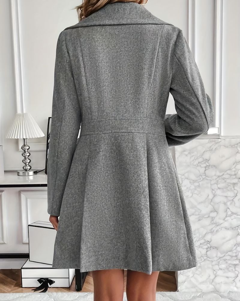 Formal women's elegant pleated longline winter coat, perfect for dressy occasions & stylish outerwear.