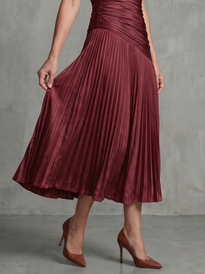 Comfort fit women's midi dress, elegant stripes & flattering pleated waist.