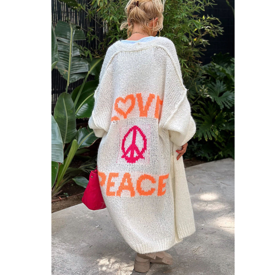 Comfortable women's long sleeve peace cardigan. Hippie vibe, bohemian fashion, a versatile layering statement piece.