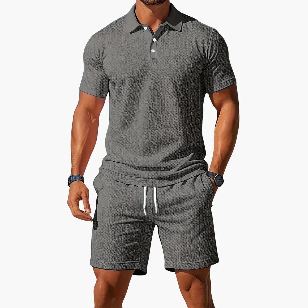 Close-up of a men's premium summer polo & shorts set, highlighting the fabric and tailored fit.