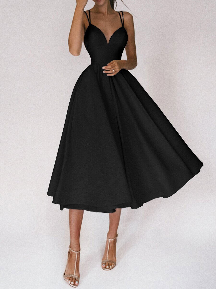 Stylish formal midi dress for women, V-neck and spaghetti straps, exuding elegance for special events.