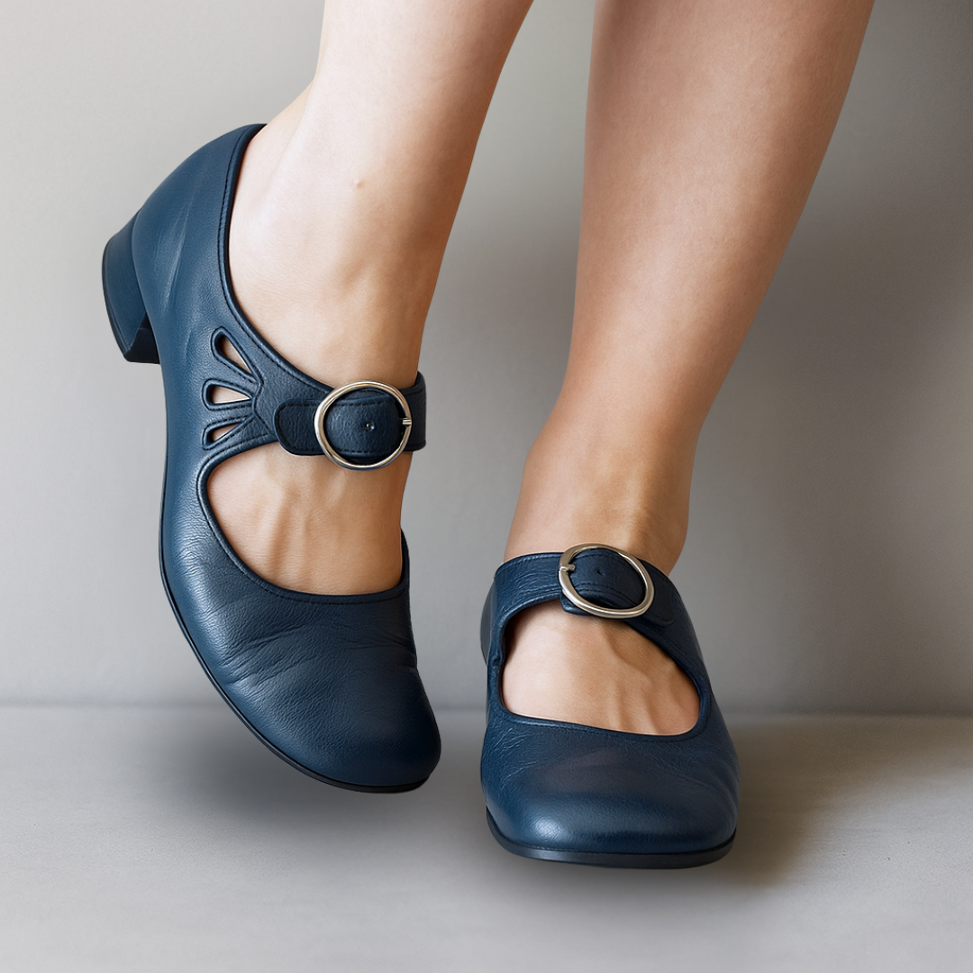 Round toe women's Mary Jane shoes, featuring a sleek buckle strap and comfortable block heel for timeless, elegant appeal.