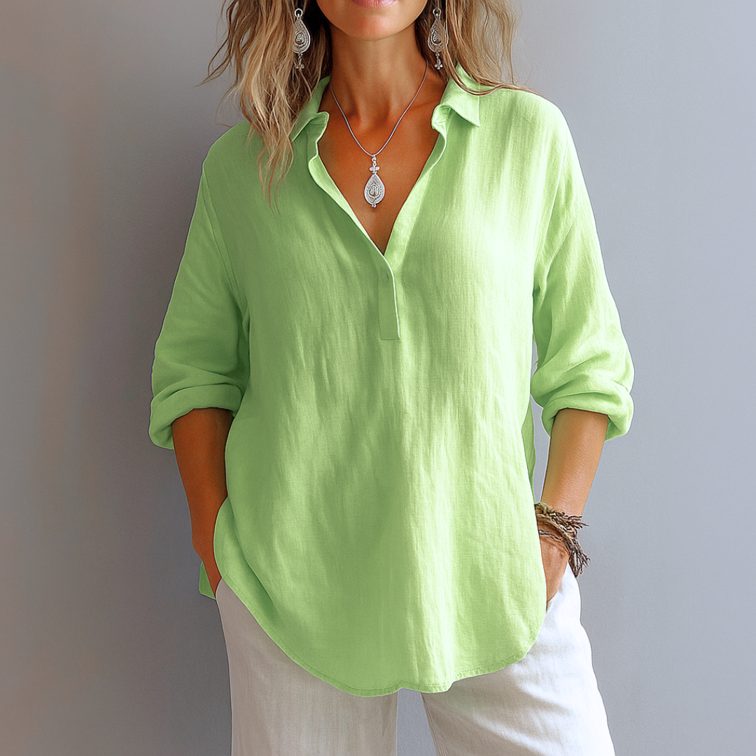 Casual yet elegant women's long sleeve collared button-up blouse. Comfortable fashion top for everyday & workwear.