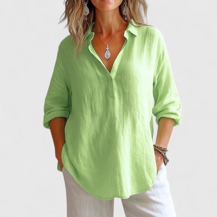 Casual elegant women's blouse featuring a comfortable, flowy design with a round neck. Perfect for summer.