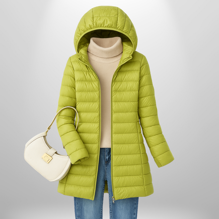 Women's warm puffer jacket, ultra-light & packable. Cozy, versatile outerwear ideal for autumn & winter travel.