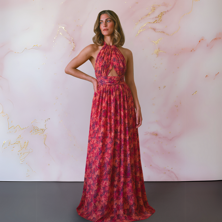 Stunning red halter maxi dress for women with a sophisticated front slit, suitable as a wedding guest dress.