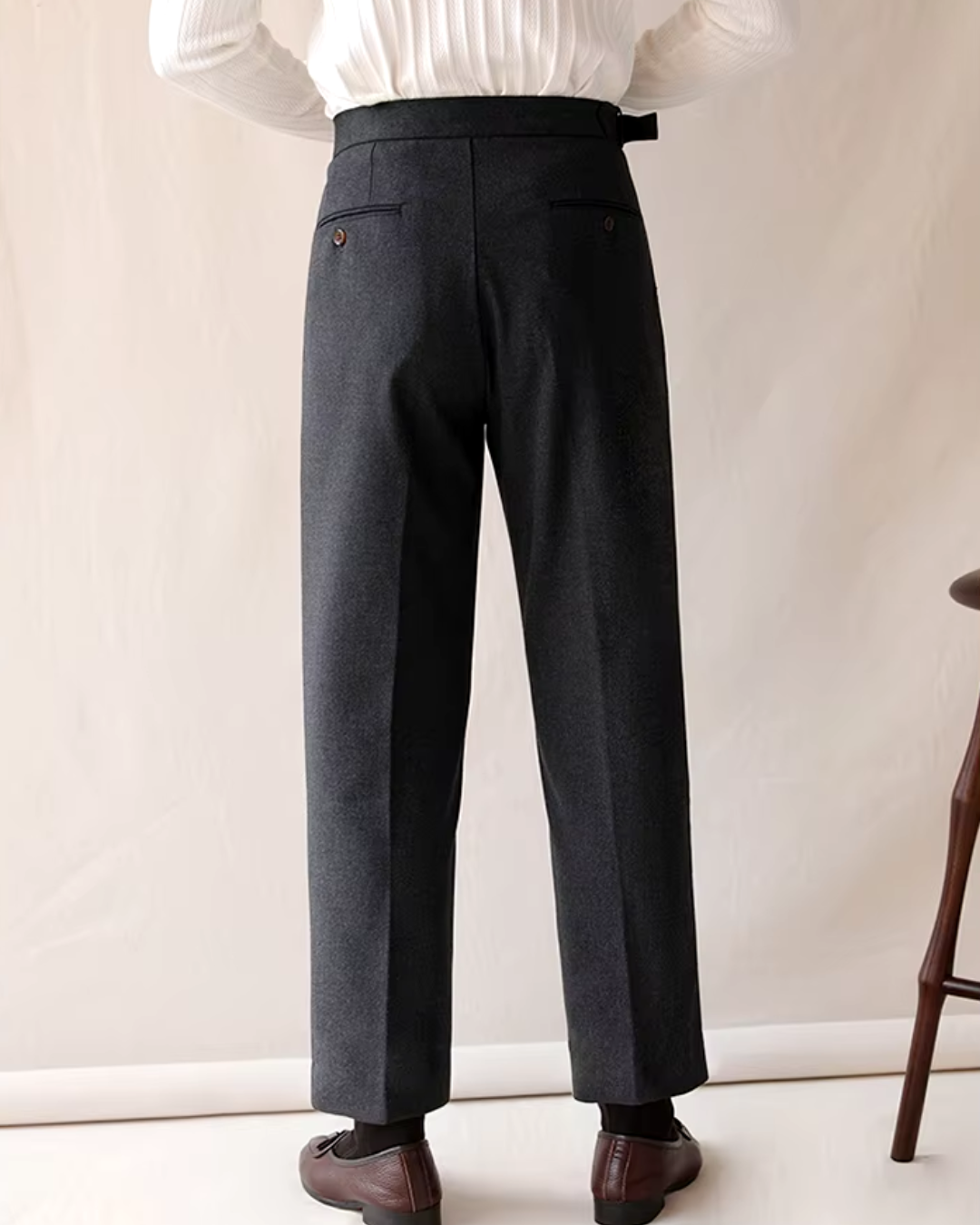 Smart casual men's brown pleated trousers, straight fit. Adjustable waist pants for modern men's fashion.