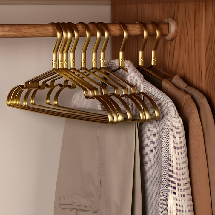Set of sleek aluminium anti-slip coat hangers. Perfect for efficient wardrobe organization & gentle garment care.