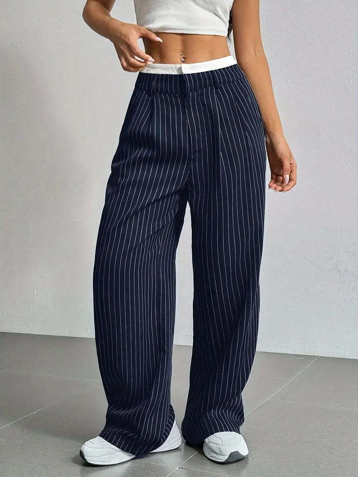 Flowy wide leg striped trousers for women, versatile and relaxed fit.