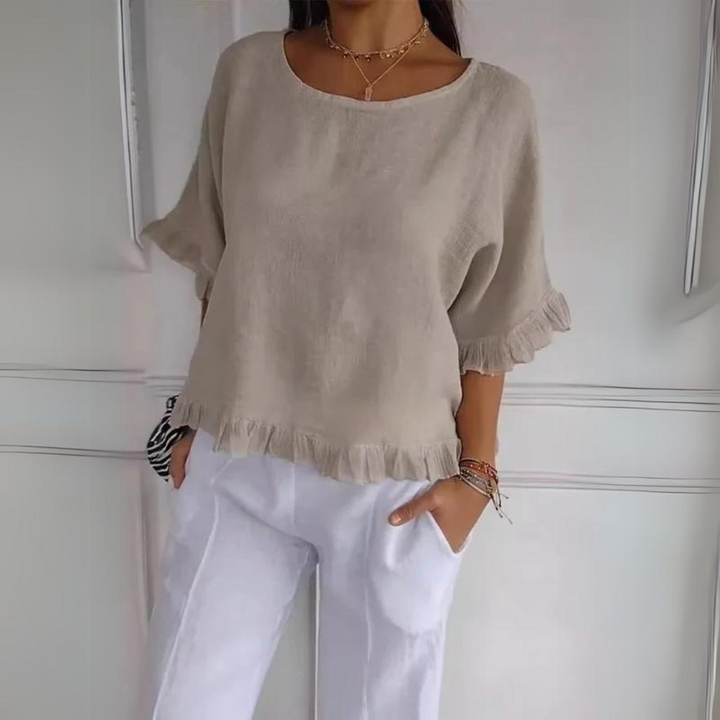 Timeless women's elegant ruffle blouse. A versatile long sleeve shirt, perfect for casual chic or formal wear.