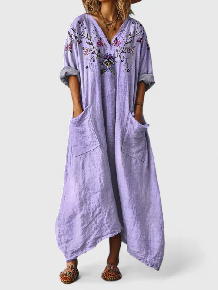 Sophisticated women's flowy maxi dress. An elegant formal dress for evening wear, cocktail parties, and special occasions.