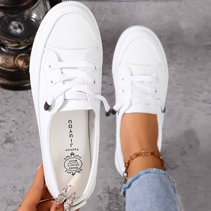 White women's orthopaedic lace-up trainers for all-day comfort & arch support.